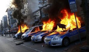 three-police-cars-on-fire-during-a-protest-in-frankfurt-564719